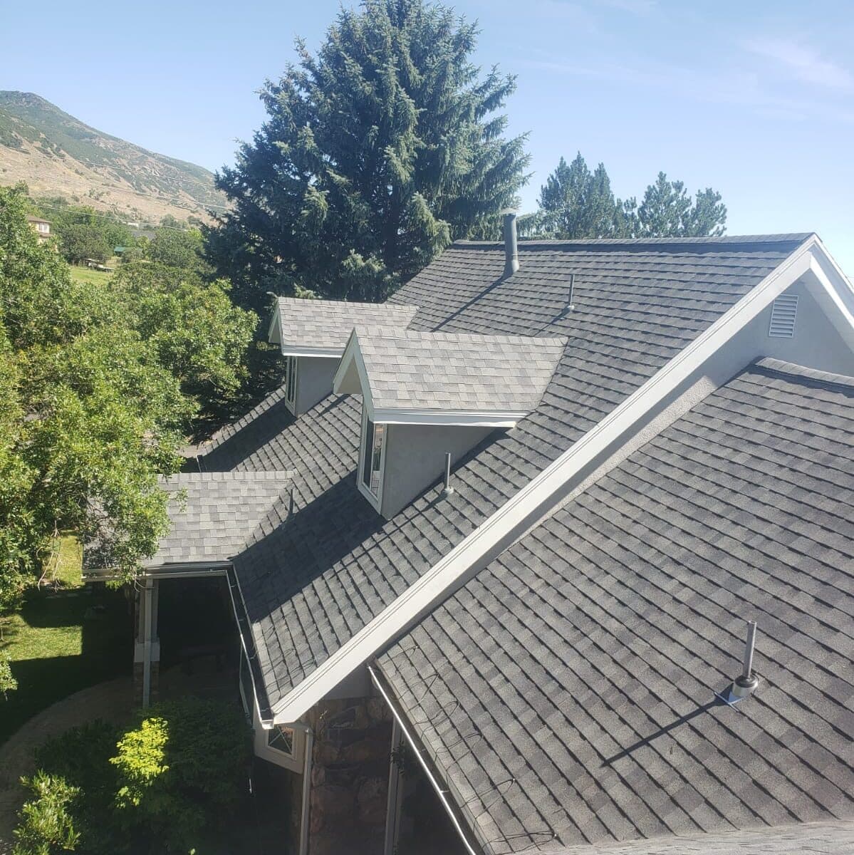 Roof with dormers on residential home